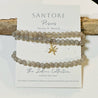 Set of beaded bracelets with Pisces symbol charm on Santore branded card