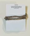 Labradorite bracelet on a card with information about the stone