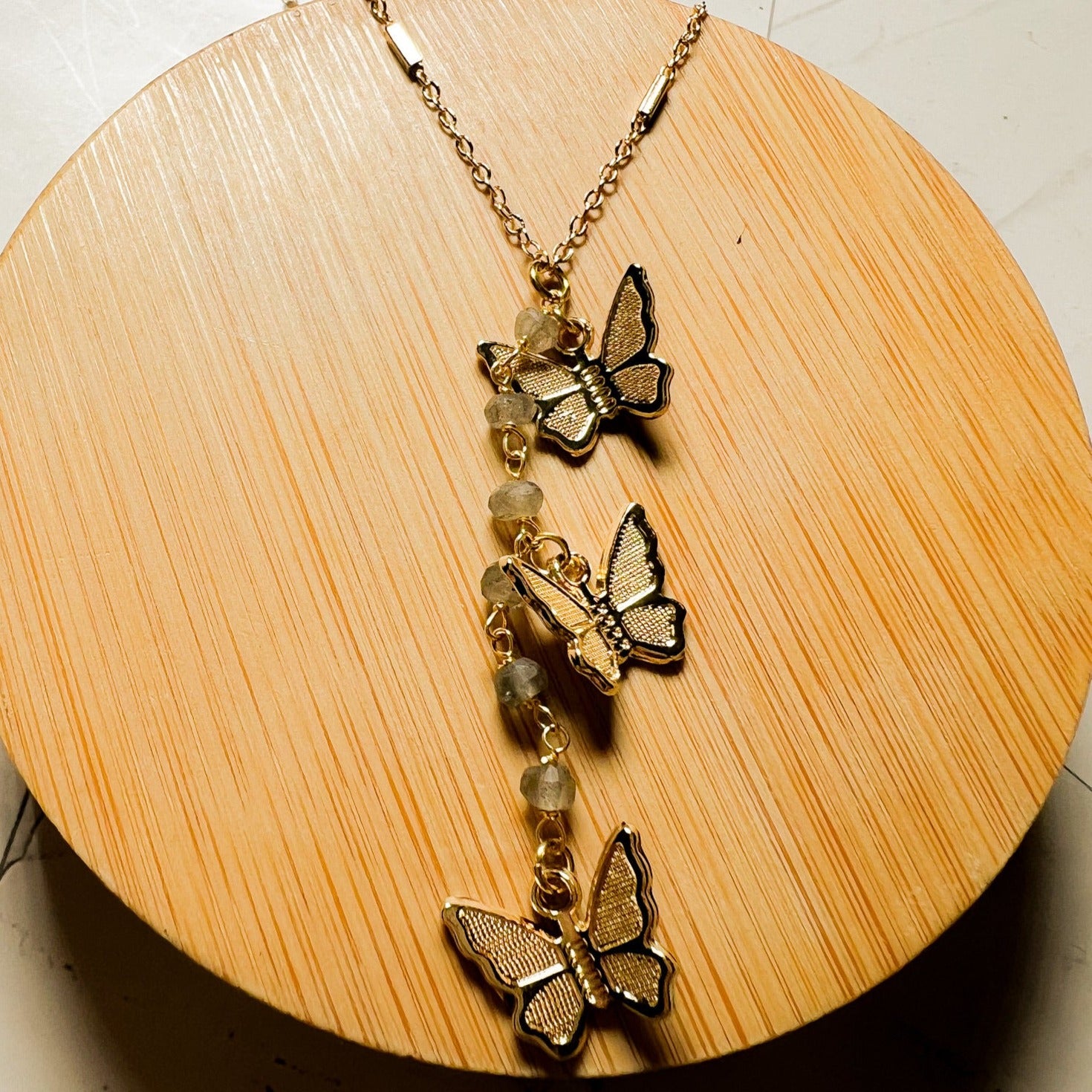Psyche: Tiny Butterfly Y Necklace