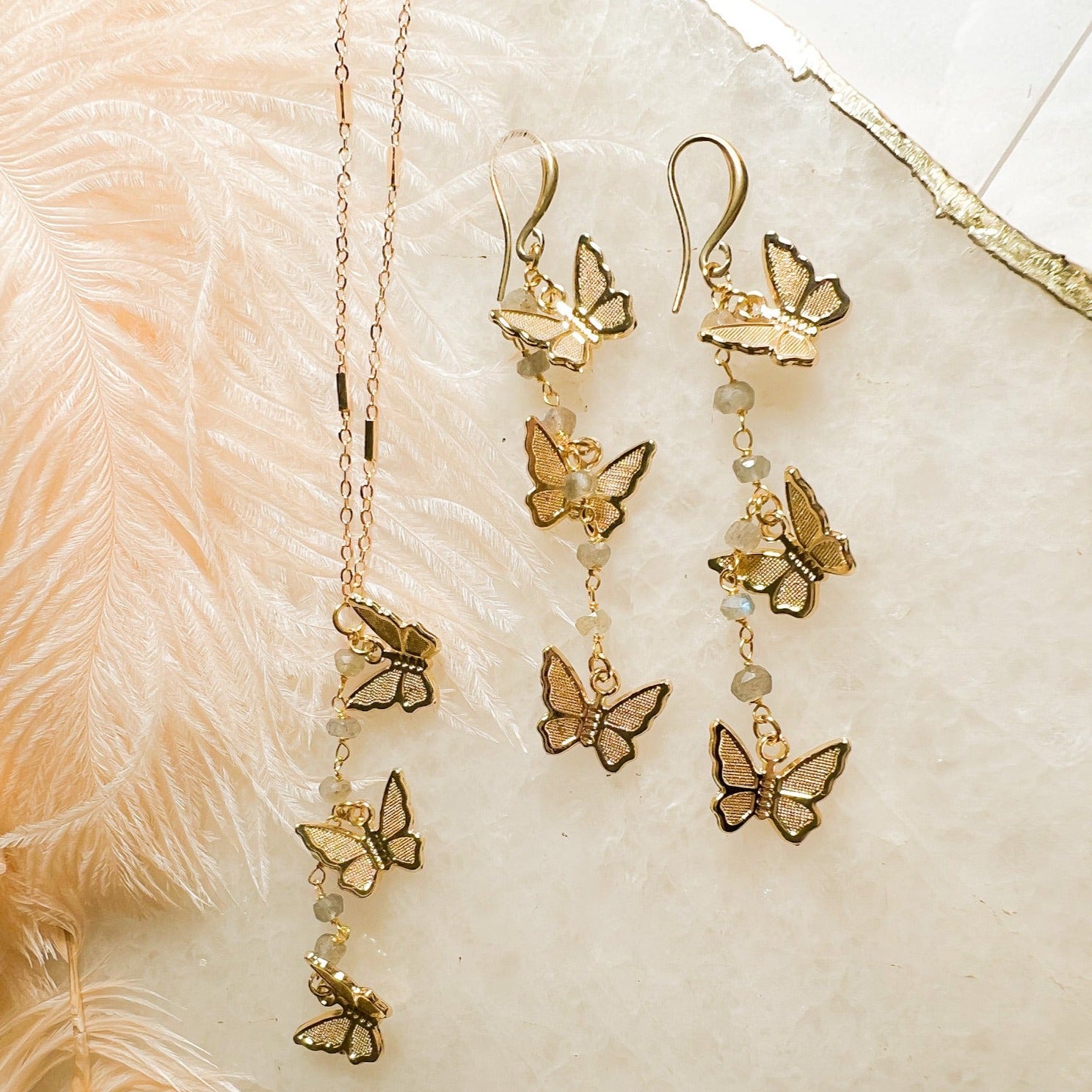 Psyche: Tiny Butterfly Y Necklace